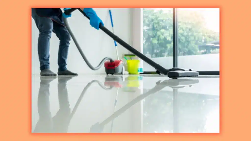 a man cleaning a floor