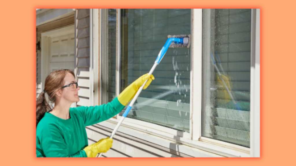 a woman cleaning Windows