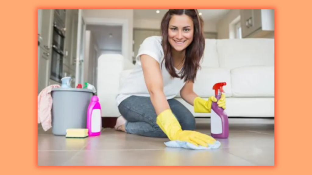 a woman cleaning the floor
