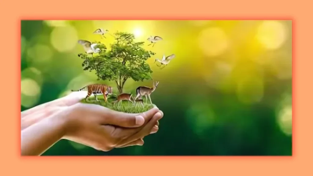 am image showing a hand holding animals and a tree signifying nature care