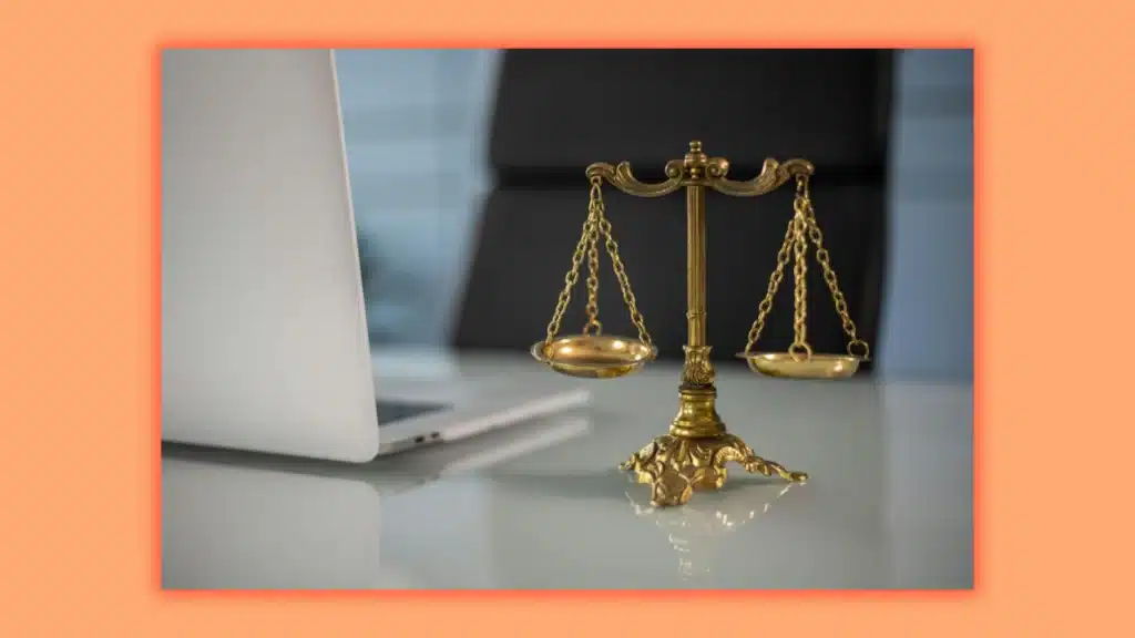 an image showing a scale symbolizing law
